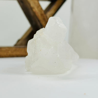 crystal quartz with decorations in the background