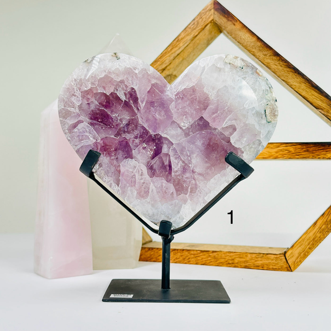 amethyst HEART with decorations in the background