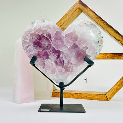 amethyst HEART with decorations in the background