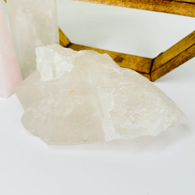 crystal quartz with decorations in  the background