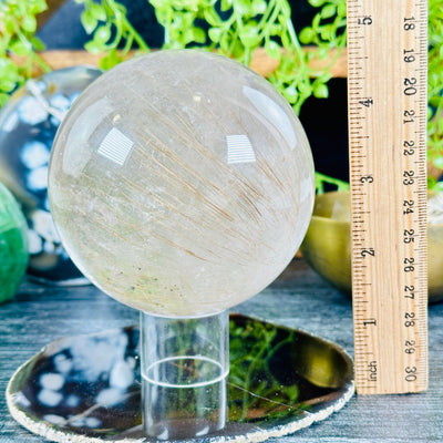 Rutilated Quartz Crystal Sphere - One-of-a-Kind front view with ruler for size reference