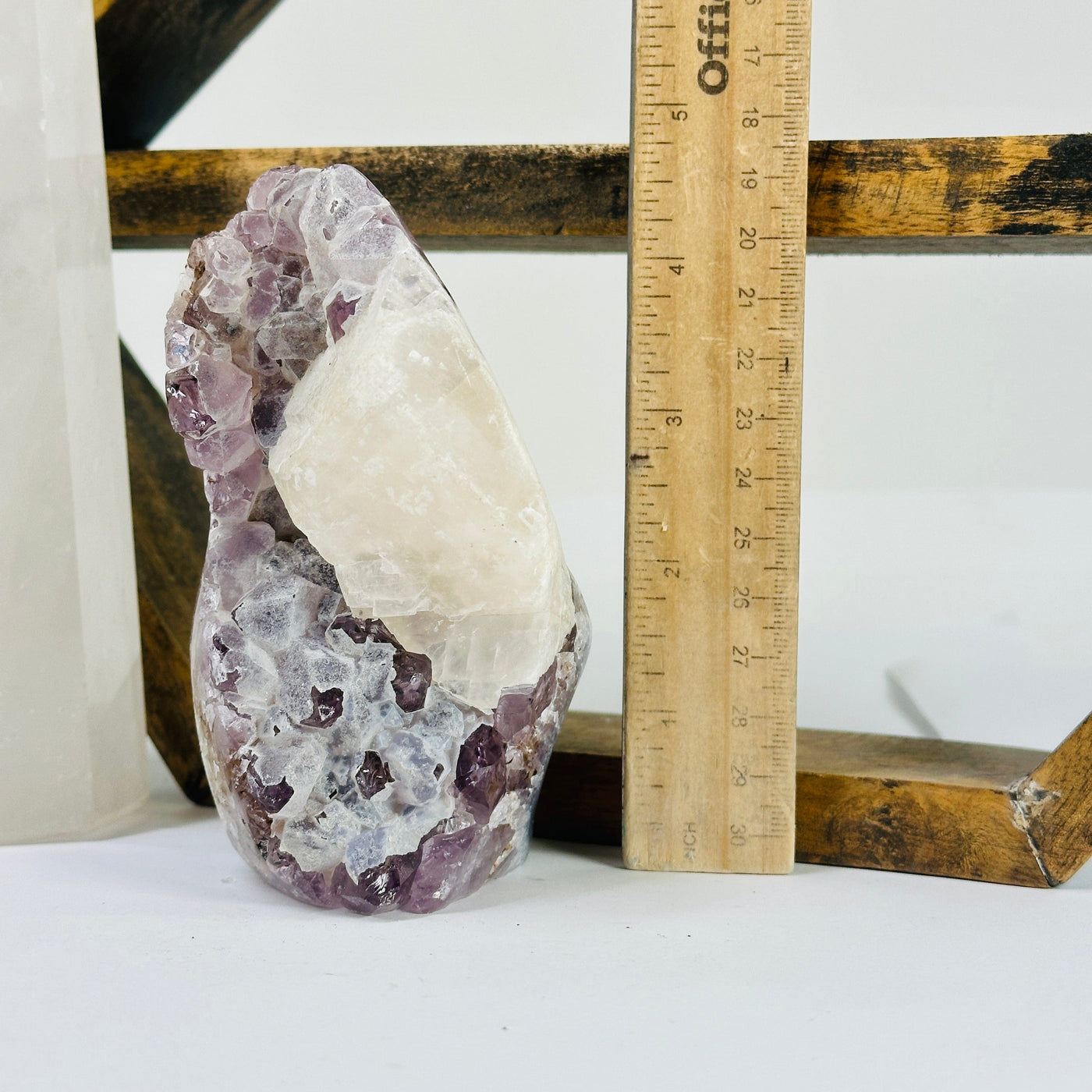 amethyst cut base next to a ruler for size reference