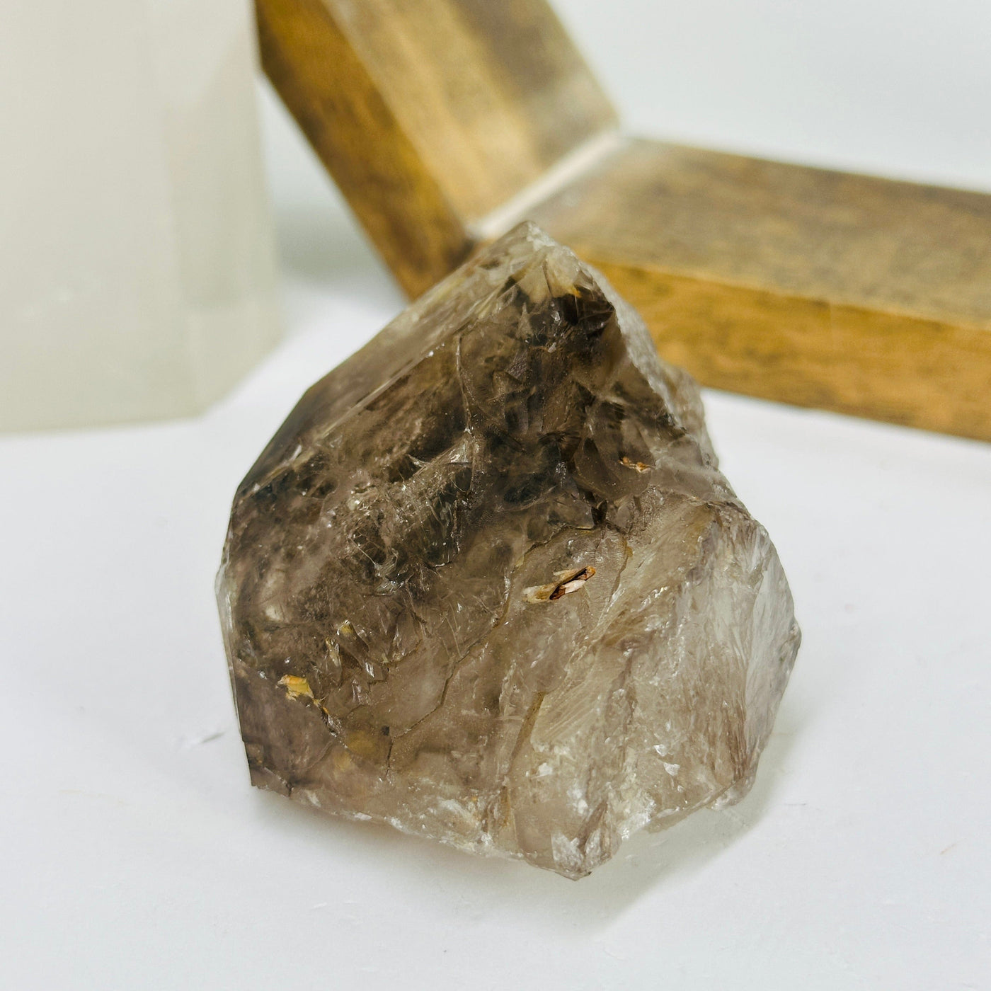 smokey quartz with decorations in the background