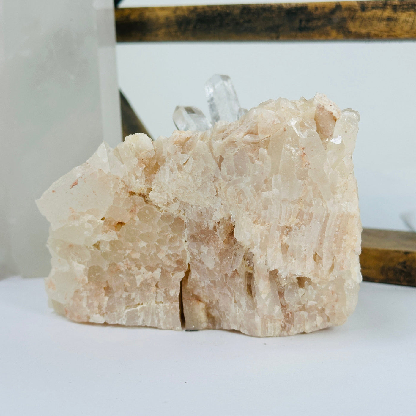 lemurian tangerine quartz with decorations in the background