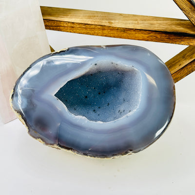 agate geode with decorations in the background