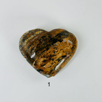 jasper heart with decorations in the background