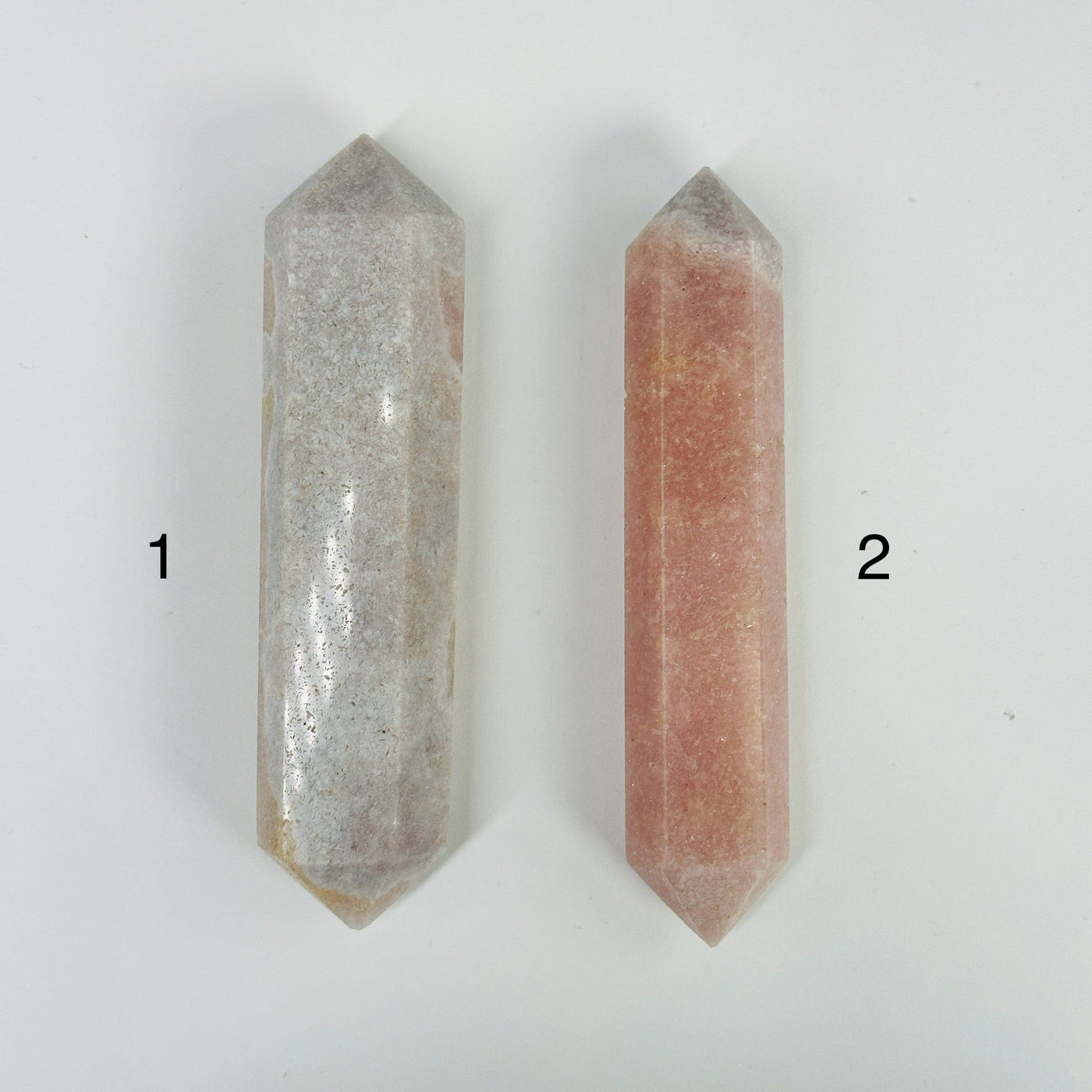 pink amethyst points with decorations in the background