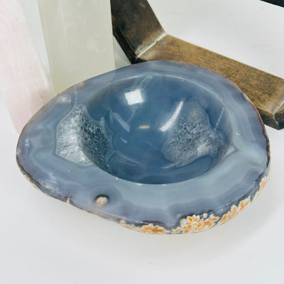 agate bowl with decorations in the background