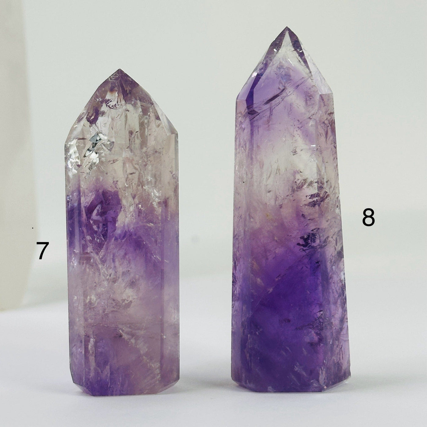 amethyst points with decorations in the background