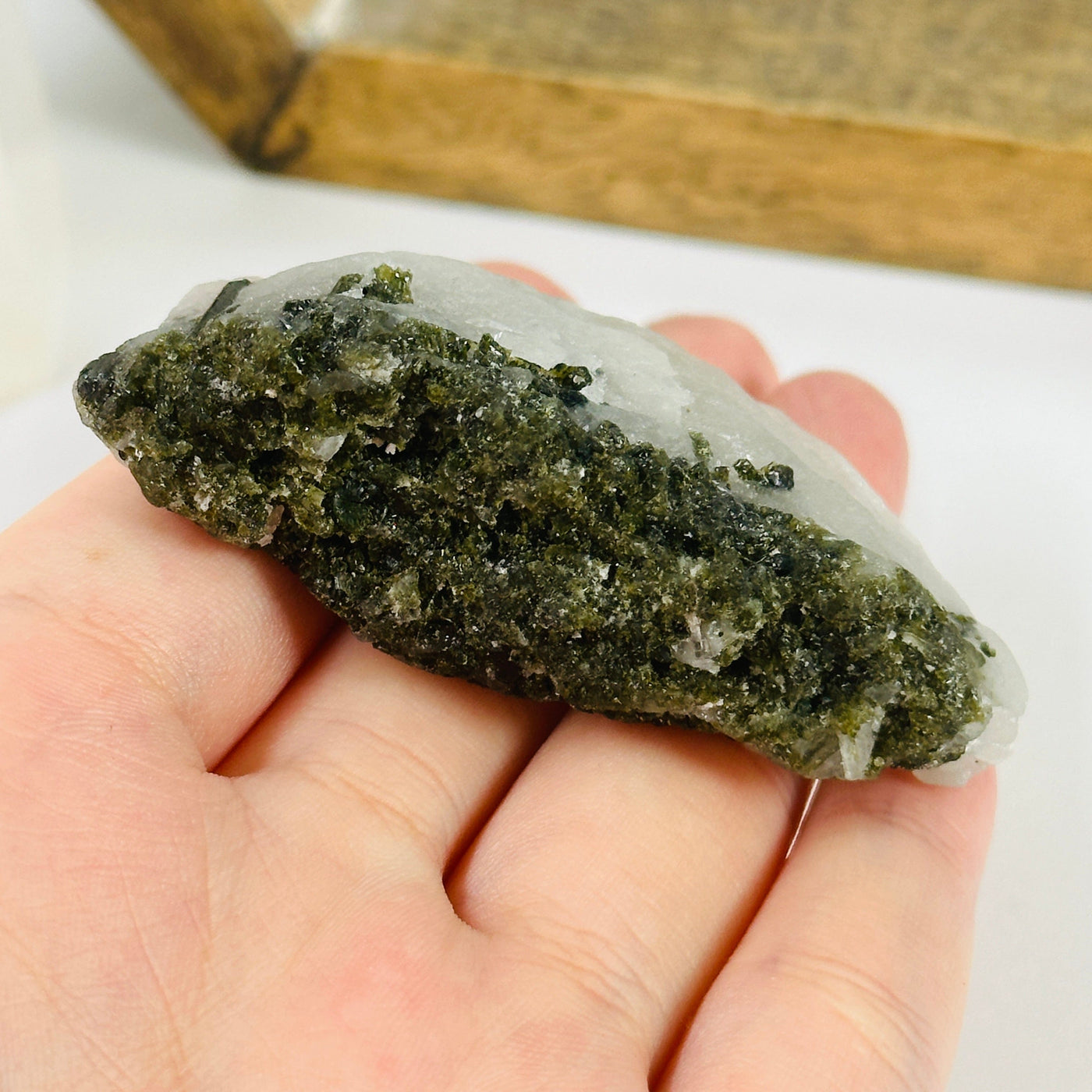 epidote with decorations in the background