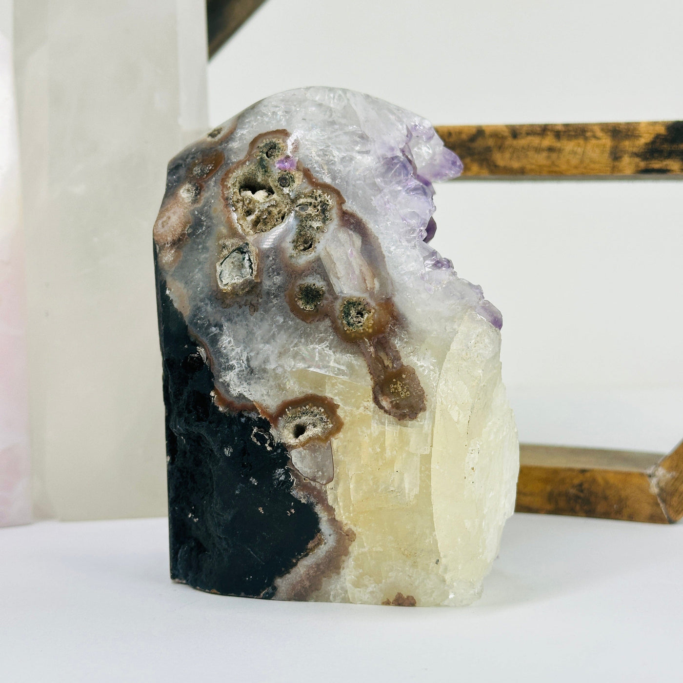 amethyst cut base with decorations in the background