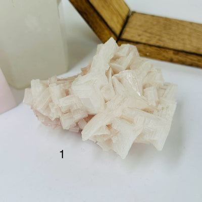HALITE CLUSTER WITH DECORATIONS IN THE BACKGROUND