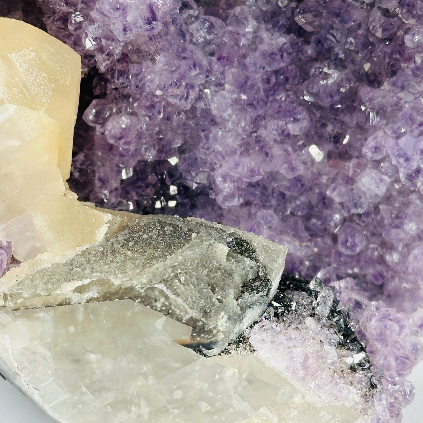 amethyst cut base with decorations in the background