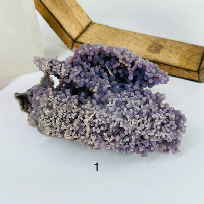 grape agate with decorations in the background
