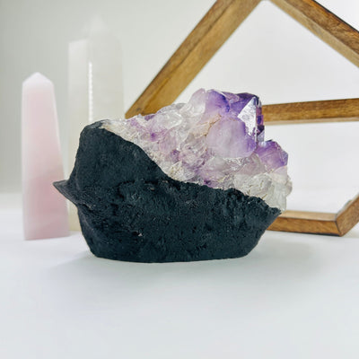 amethyst cut base with decorations in the background