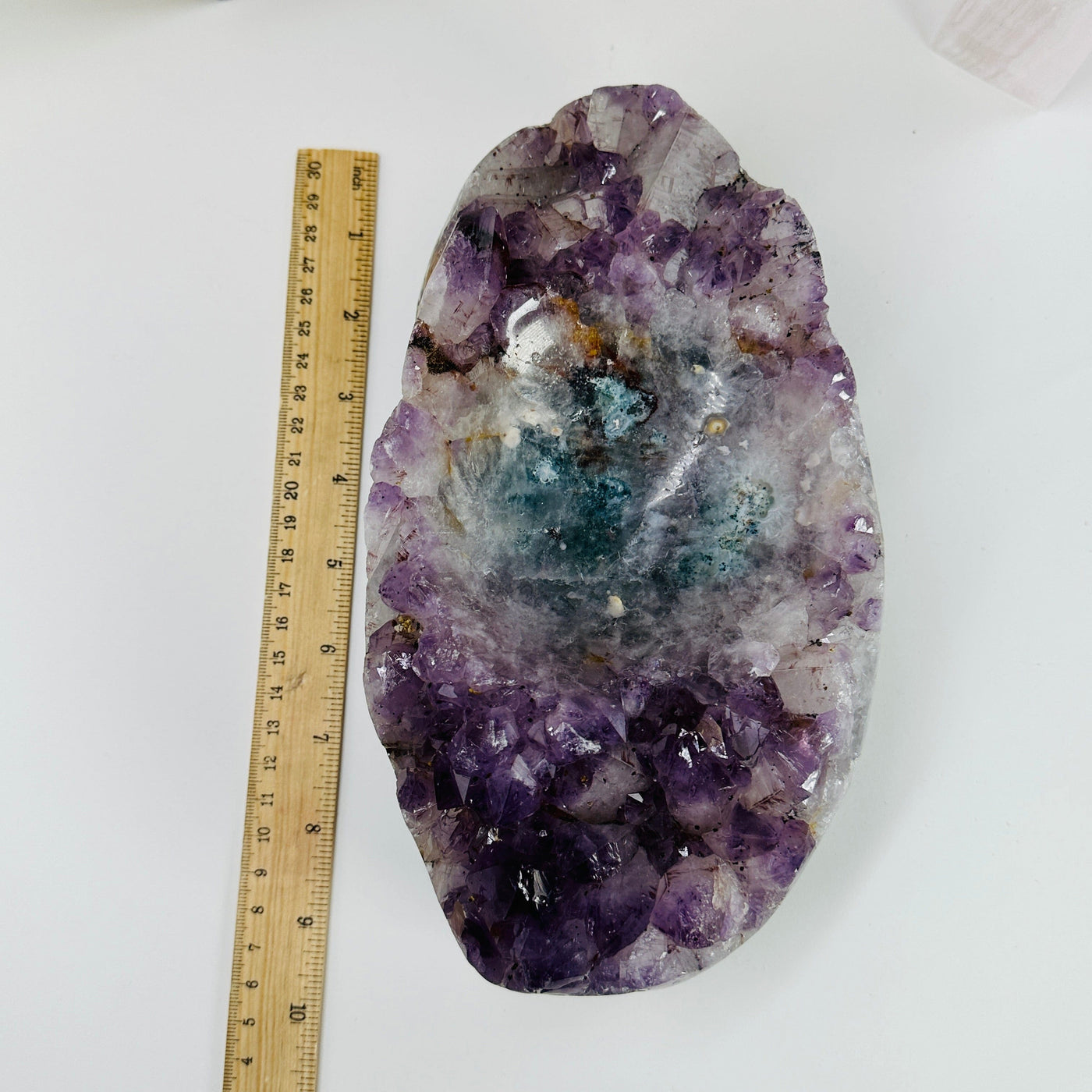 amethyst bowl next to a ruler for size reference