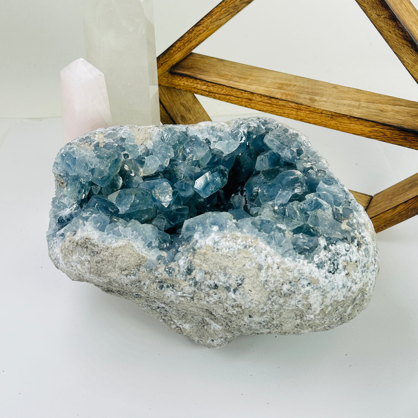 Celestite with decorations in the background