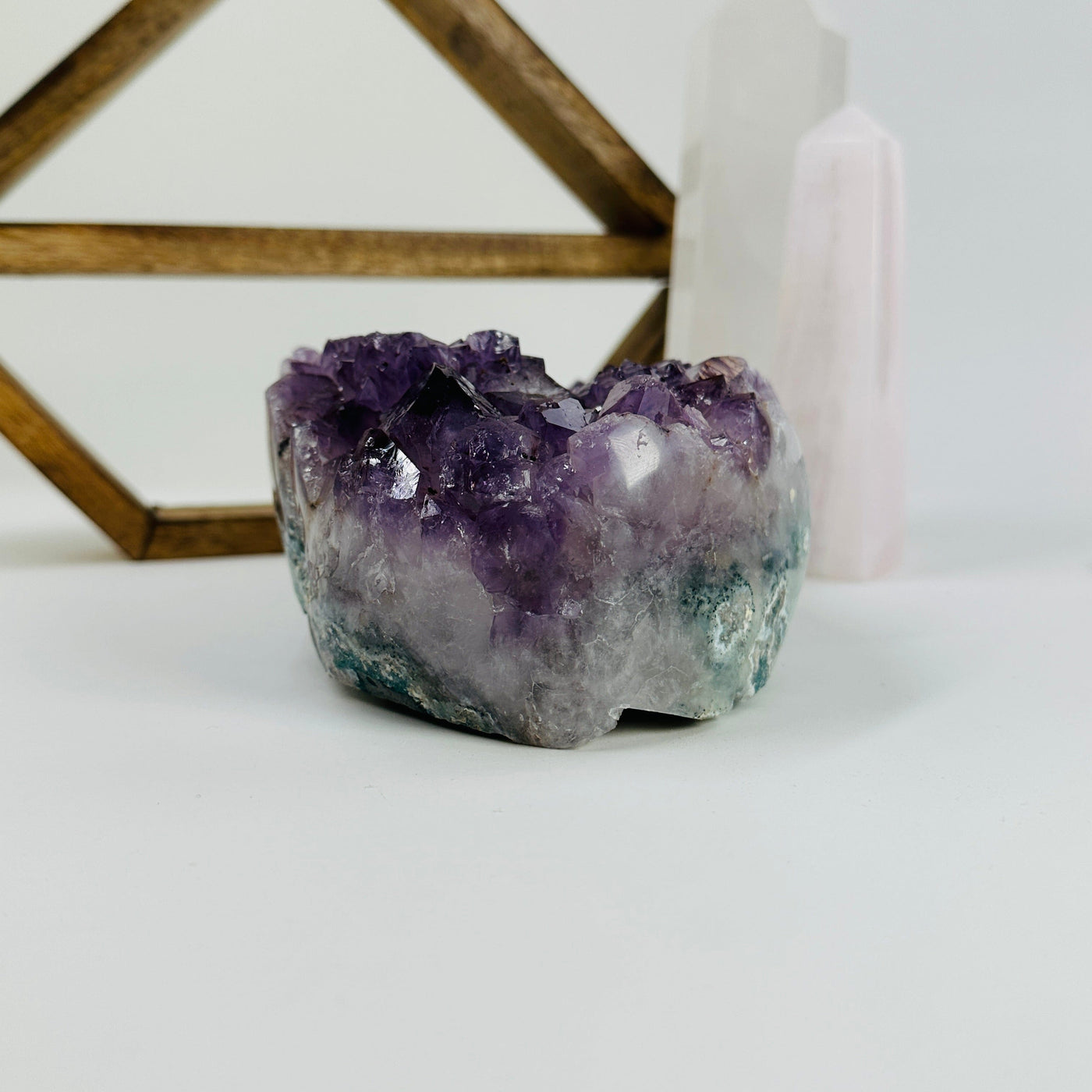 amethyst bowl with decorations in the background