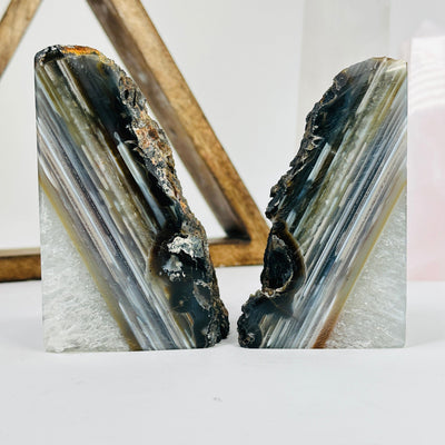side view of agate bookends with decorations in the background