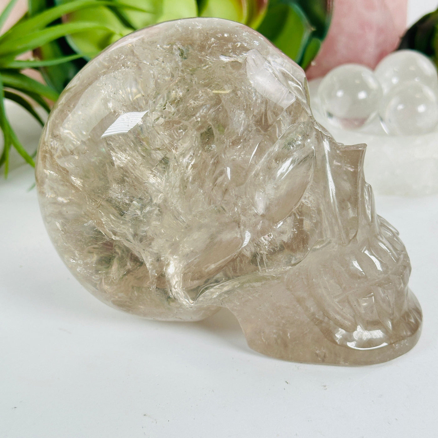 Crystal Quartz Skull Sculpture - As Is side view