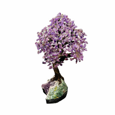 amethyst tree on amethyst stand on white background