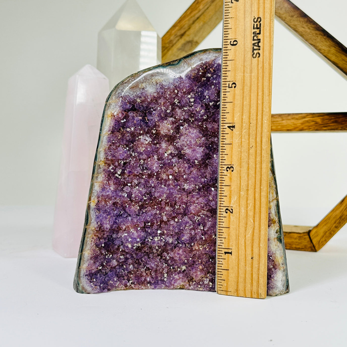 amethyst cut base next to a ruler for size reference