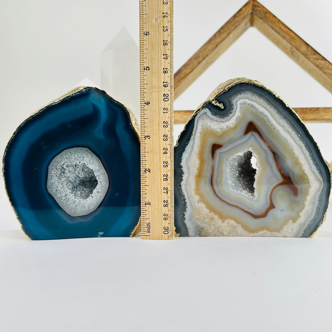 agate cut base next to a ruler for size reference