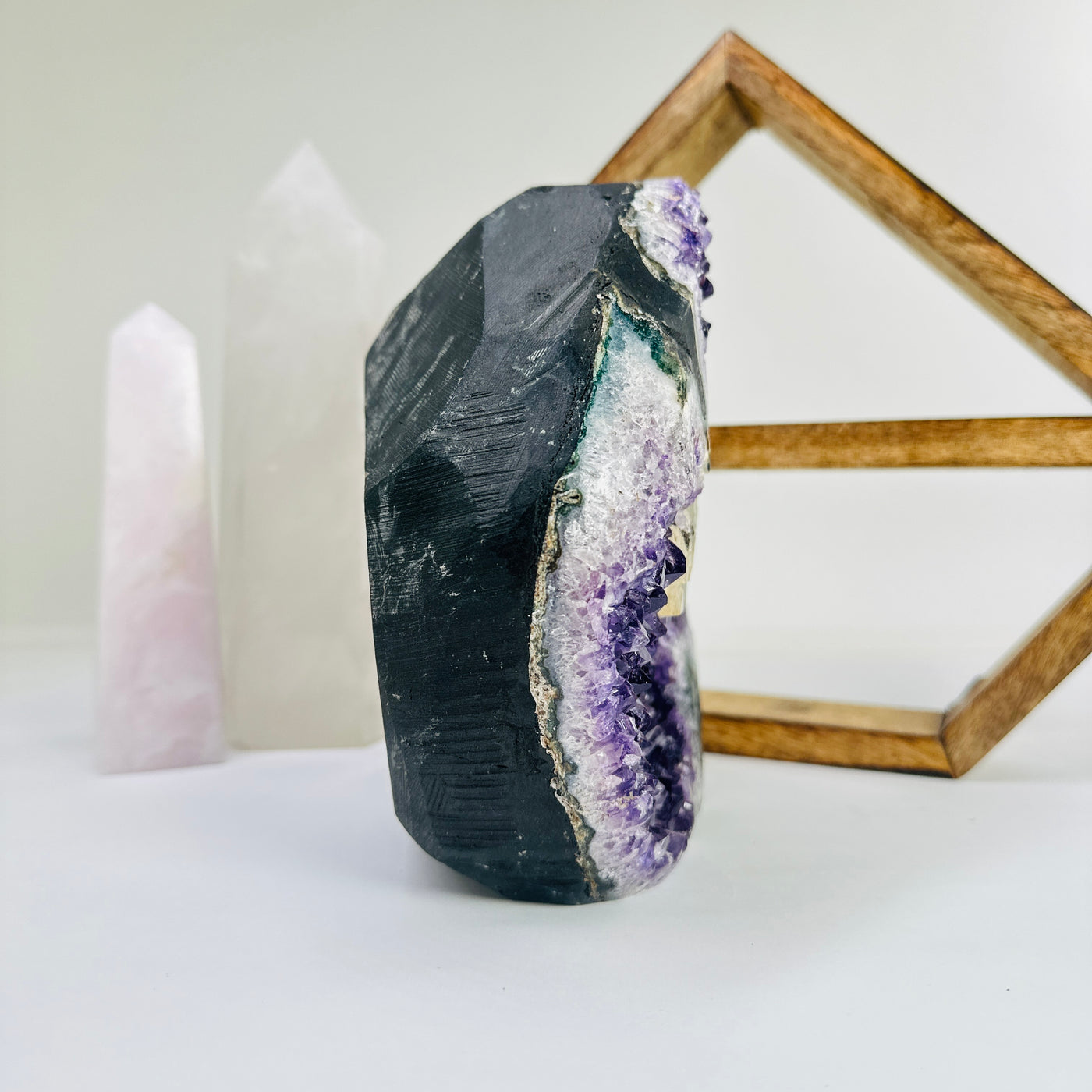 amethyst cut base with decorations in the background