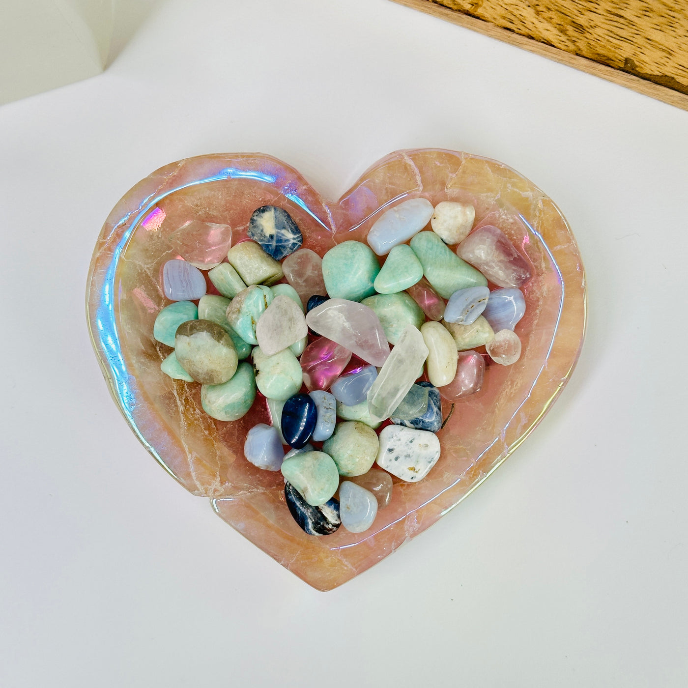 rose quartz bowl with decorations in the background