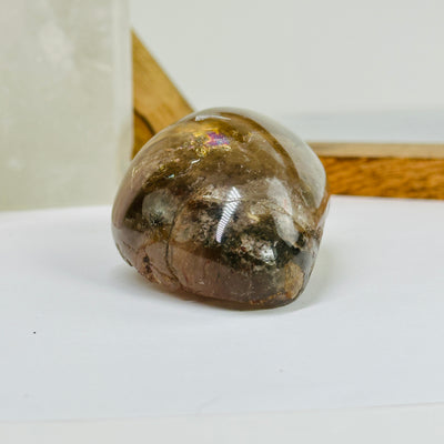 smokey quartz with decorations in the background