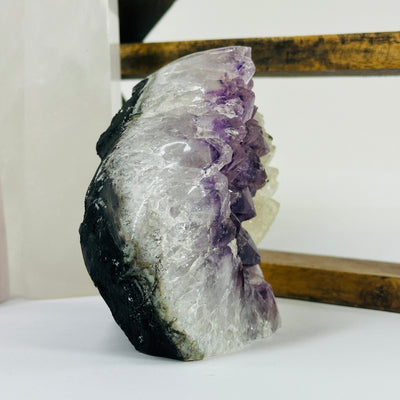 amethyst cut base with decorations in the background