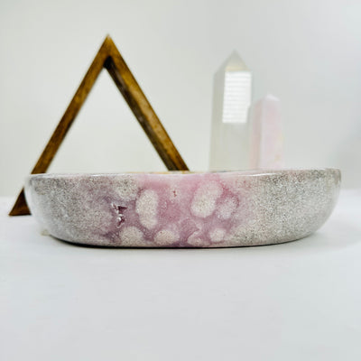 pink amethyst bowl with decorations in the background