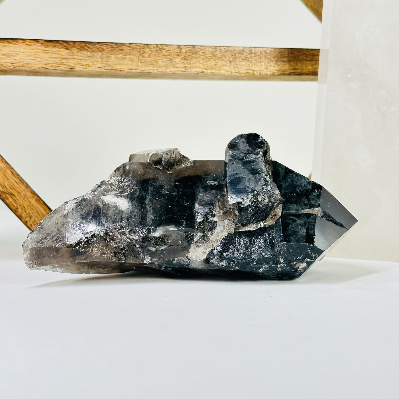 smokey quartz with decorations in the background