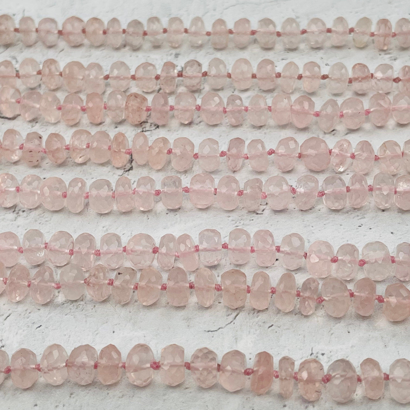 close up of the faceted rose quartz beads 