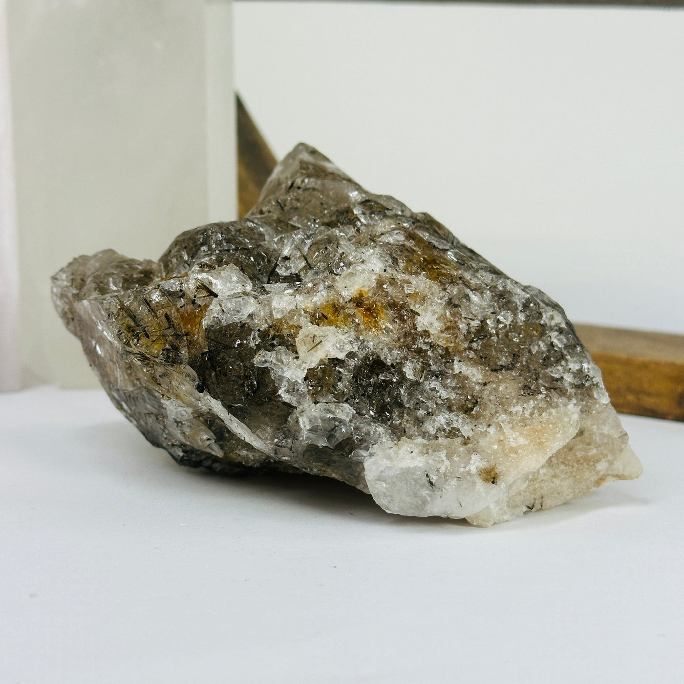 rutile quartz with decorations in the background