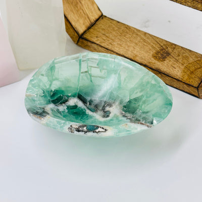 Crystal Fluorite Bowl with decorations in the background