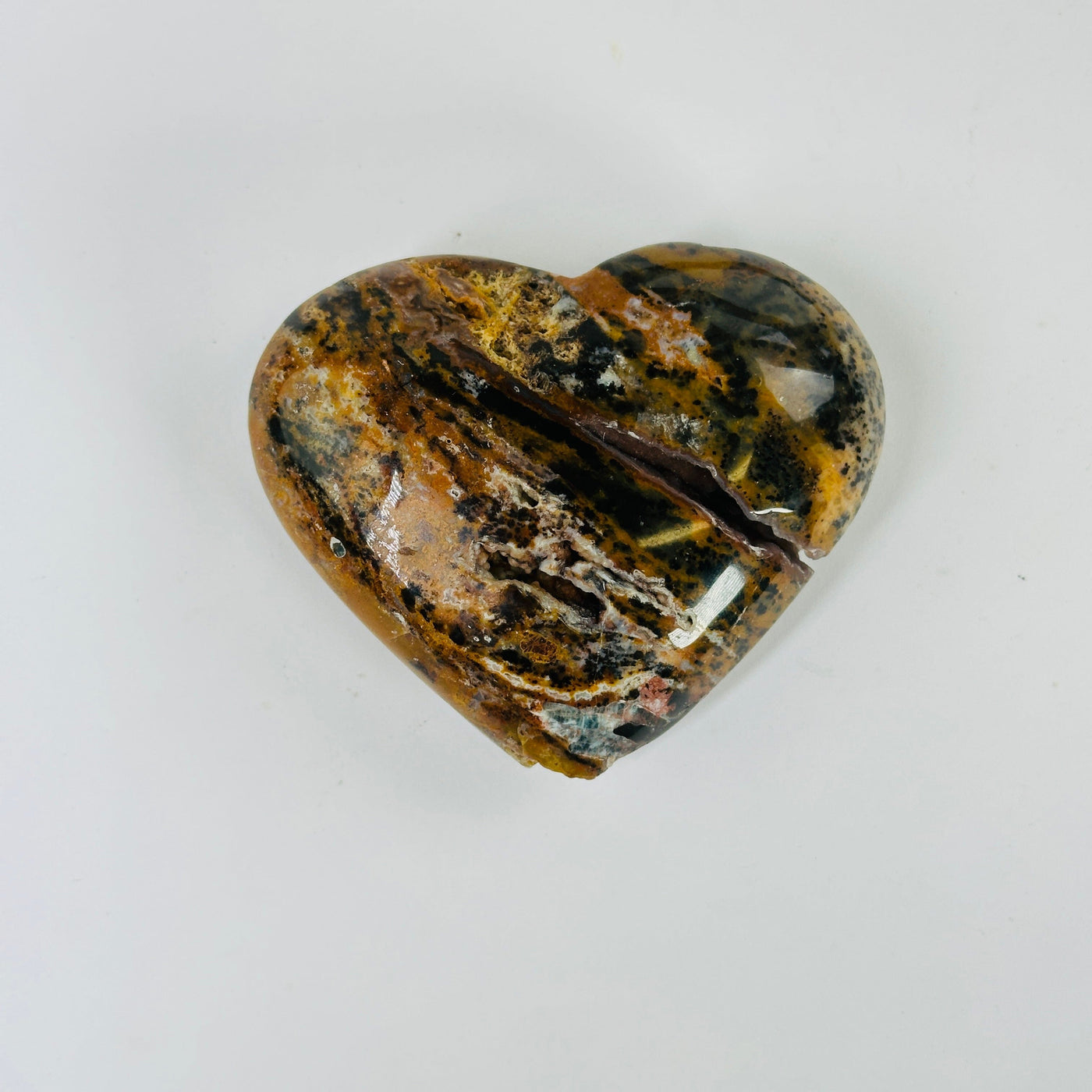 jasper heart with decorations in the background