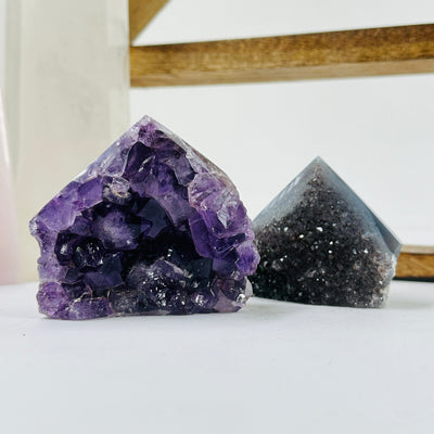 amethyst points with decorations in the background