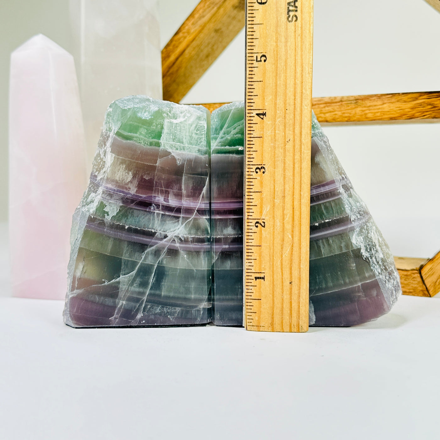 fluorite bookend with decorations in the background