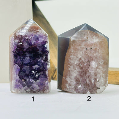 amethyst point with decorations in the background