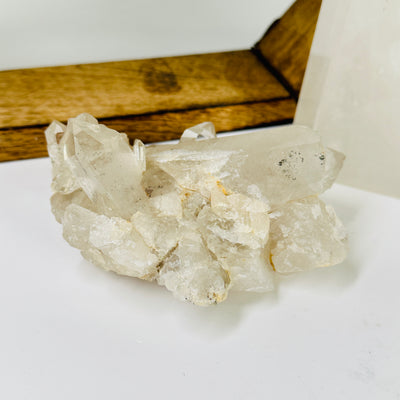 crystal quartz with decorations in the background