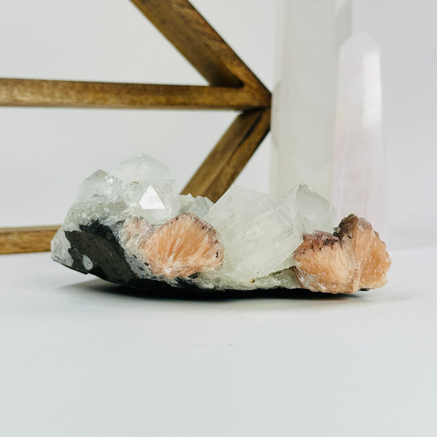 stilbite with apophyllite with decorations in the background
