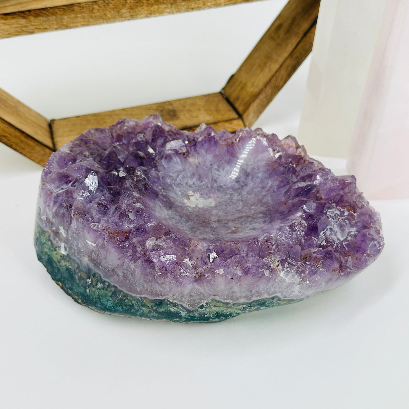 amethyst bowl with decorations in the background