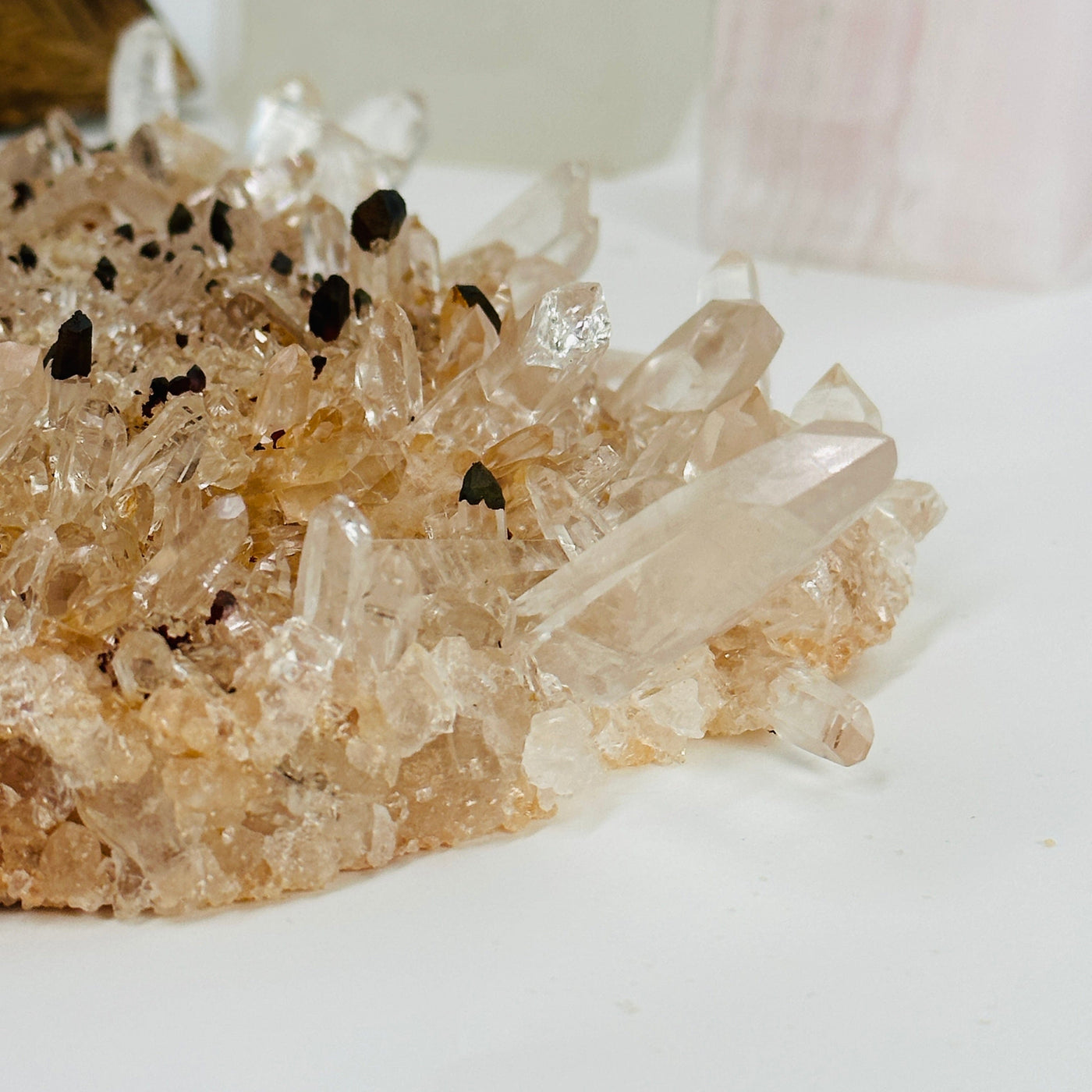 laser quartz cluster with decorations in the background