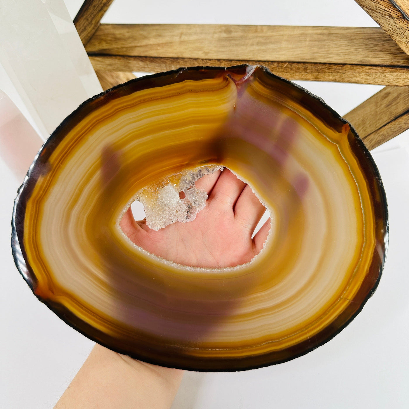 agate slice with decorations in the background