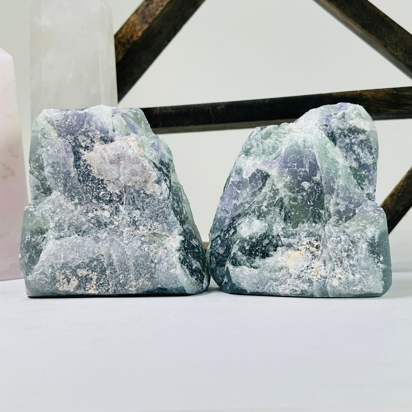 fluorite bookends with decorations in the background