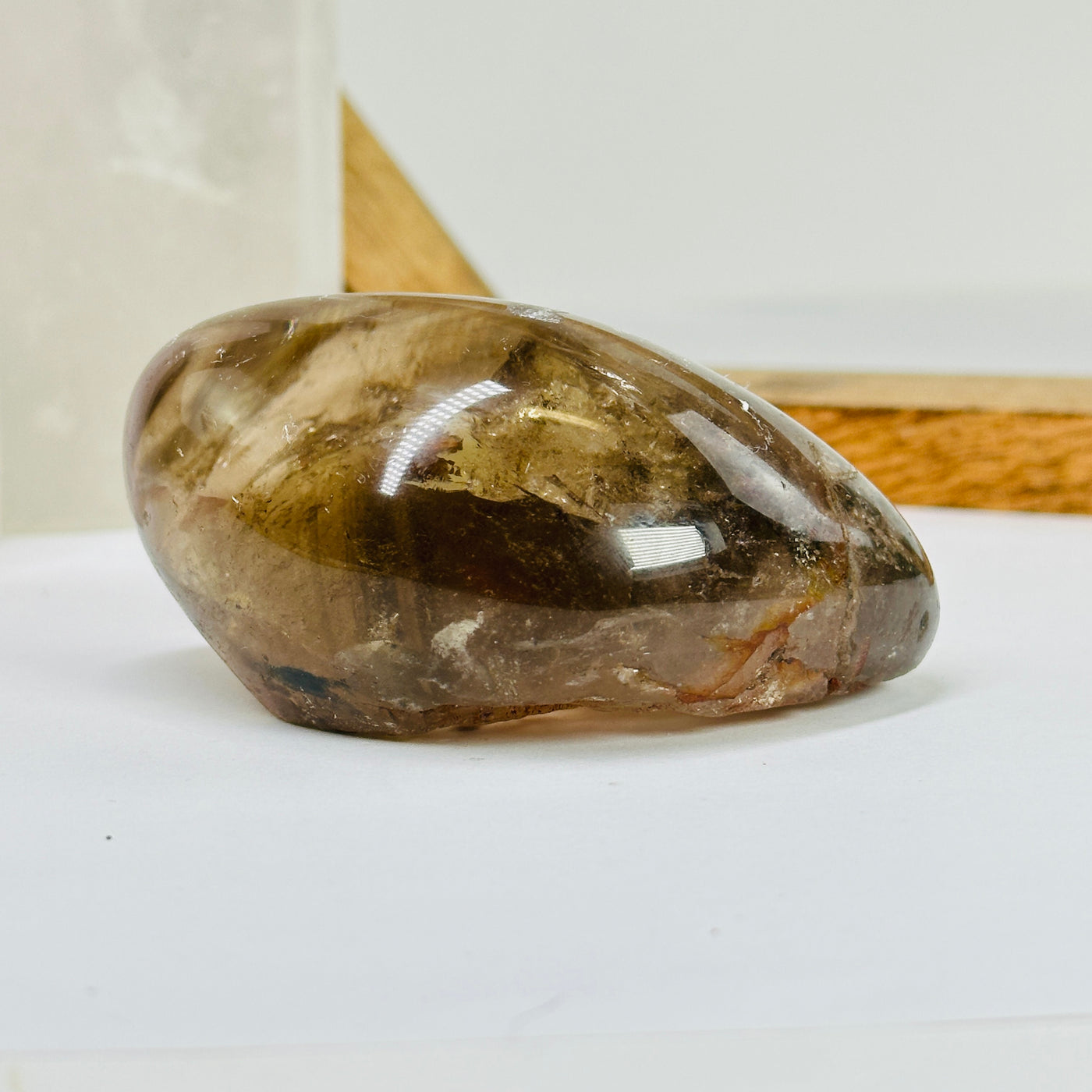 smokey quartz with decorations in the background