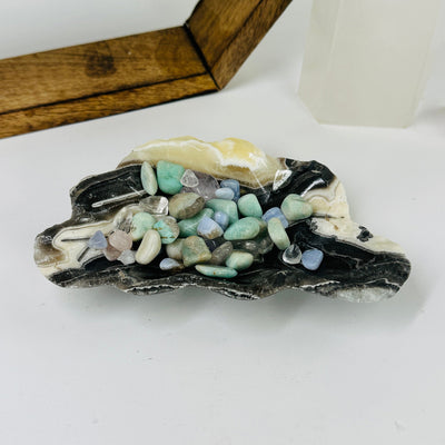 mexican onyx bowl with decorations in the background