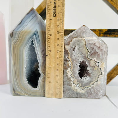 agate point next to a ruler for size reference