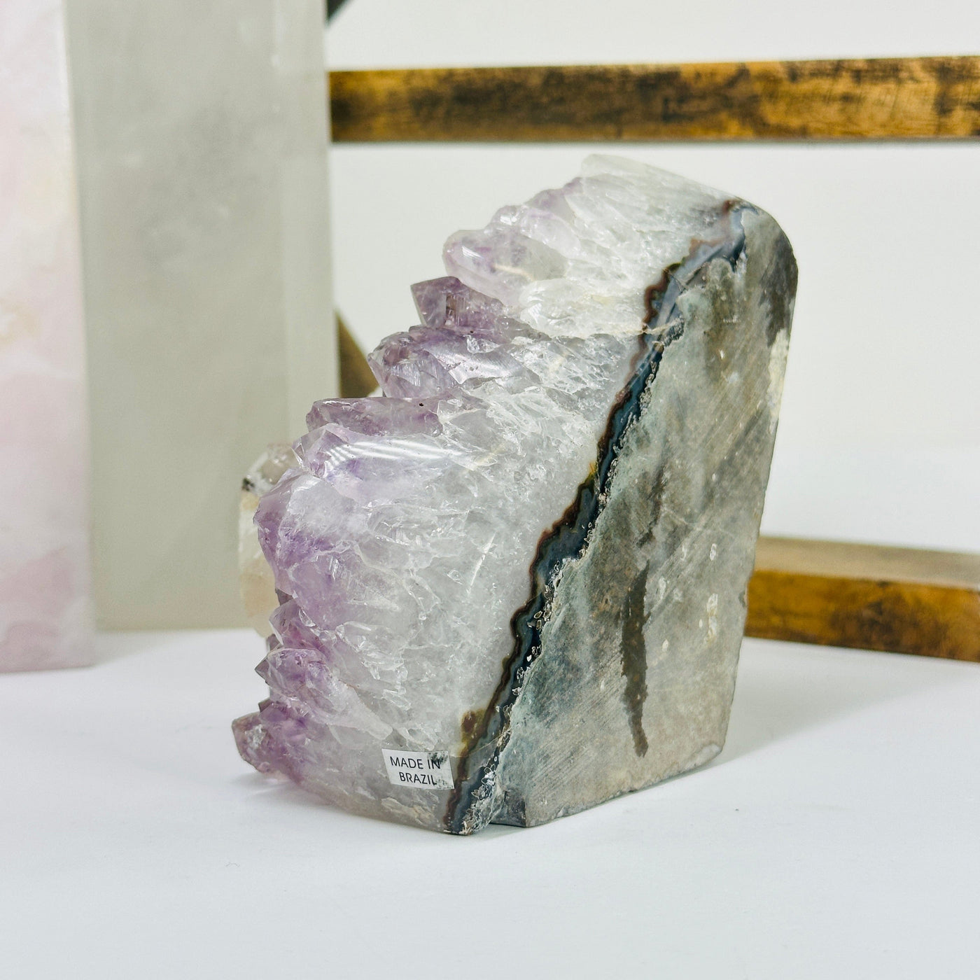 amethyst cut base with decorations in the background